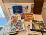 Nintendo 2DS Blue Bundle W/ Case And 8 Games (kirby Canvas, Yo-kai Watch & More) Used. Price: $250.00.