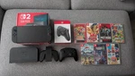 Nintendo Switch Console + Pro Controller 256GB Memory Card 7 Games Used. Price: $750.00.