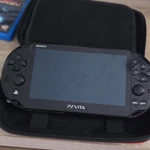 Modded Sony Ps Vita Console Carrying Case, 8GB & 64GB Memory Cards, 9 Games Used. Price: $280.00.