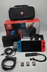 Nintendo Switch 32GB Neon Red & Blue Joy-con Bundle HAC-001 W/ Games. Nice! Used. Price: $240.00.