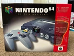 New Nintendo System N64 Console - Charcoal Gray Original Box. Price: $1499.90.