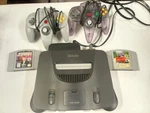 Nintendo N64 Console System Bundle With 2 Controllers Games And Memory Card Used. Price: $199.95.