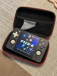 Powkiddy RGB30 Handheld Console With Case, 64GB Microsd, Games Loaded Open. Price: $80.00.