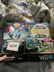 Nintendo Wii Mario & Luigi Premium Pack 32GB Black Handheld System Used. Price: $200.00.