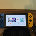 Nintendo Switch Console Blue Yellow Joy-con Dock Zelda Breath Of The Wild Case Used. Price: $145.00.