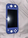 Nintendo Switch Lite Blue Handheld Gaming Console With Headphone Jack Used. Price: $150.00.