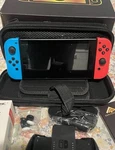Nintendo Switch With Tv Dock, Controller Joycons & Carrying Case - 32 Gb Used. Price: $170.00.