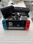 Nintendo Switch V1 Neon Red Blue Joy Cons Bundle Read Used. Price: $175.00.