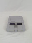 Super Nintendo Snes System Console With 2 Controllers Used. Price: $155.00.