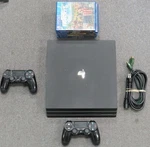 Sony PS4 CUH-7115B Playstation Pro Console W/ Cords, 2 Controllers & Games Used. Price: $199.00.