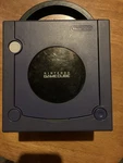Nintendo Gamecube Console - Purple, Includes Box But Has Heavy Wear! Rf Cord Open. Price: $131.00.