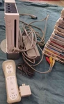 Nintendo Wii Console Bundle W/ Remote, Sensor Bar, Av/power Cables & Games Used. Price: $125.00.