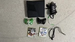 Black Microsoft Xbox 360 With Power Cords And Two Controllers, Tested Used. Price: $99.99.