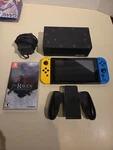 Nintendo Switch Fortnite Special Edition Game Console - Blue/yellow Charger Dock Used. Price: $160.00.