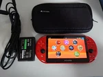 Playstation Ps Vita PCH-2000 ZA26 Metallic Red Sony Console ,pouch ,charger Used. Price: $180.00.