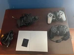 Sony Playstation 2 Game Console - Silver (memory Card And Controllers Included!) Used. Price: $150.00.