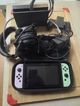 Nintendo Switch Oled With Super Smash Bros Ultimate Headset And Dock Used. Price: $220.00.