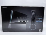 New Nintendo Wii With Sports + Resort Black Console System Bundle. Price: $599.99.