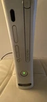 Microsoft Xbox 360 White, Just Consule, Including 2FREE Games Used. Price: $44.99.