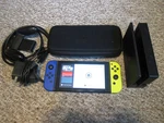 Nintendo Switch System 32GB Console W/neon Yellow & Blue Joy-cons +case Extras Used. Price: $169.95.