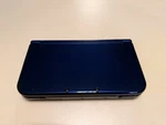 Nintendo New 3DS Metallic Blue Handheld Console Used Good Condition. Price: $260.00.