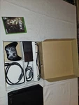 Microsoft Xbox One Fallout 4 Bundle 1TB Black Console With Controller Open. Price: $200.00.
