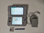 Nintendo New 3DS Xl Snes Edition 128 Gb Sd Card, Stylus, Charger & Game Used. Price: $600.00.