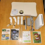 Nintendo Wii Console Bundle W/ Remotes Nunchuks Sensor Bar Fit Play Used. Price: $99.99.