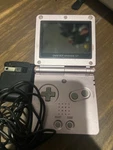 Nintendo Game Boy Advance Sp Handheld System - Pearl Pink Used. Price: $100.00.