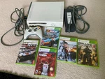 Microsoft Xbox 360 Pro Launch Edition 60GB System W/ Controller & 5 Games Used. Price: $119.99.