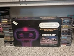 Nintendo Nes Deluxe Set System Console W/ The Robot Complete Box 24 Game Used. Price: $1000.00.