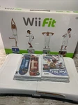Nintendo Wii Fit Balance Board W/ 4 Games-skate, Ski & Workout Cds. Used. Price: $39.95.