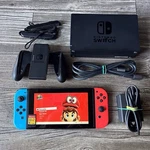 Nintendo Switch Neon Red And Blue With Mario Odyssey Super Maker Used. Price: $224.97.