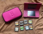 Nintendo Dsi Pink Handheld Console System TWL-001 With Stylus, Case, Eight Games Used. Price: $119.99.