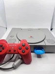 Sony Playstation 1 Console Gray (w/ All Cables, Controller & Memory Cards) Used. Price: $40.00.