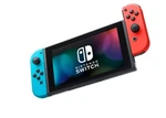 Nintendo Hadskabah Switch With Neon Blue And Red Joycon Open. Price: $209.00.