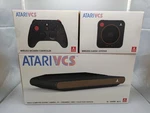 Atari Vcs 800 "day One" Collector Ed Wood Panel Ltd 6000 & 2 Controllers New. Price: $350.00.