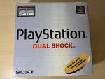 Sony Playstation Game System PS1 SCPH-7001 Dual Shock Mint Open. Price: $349.99.