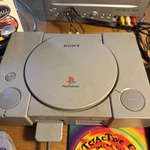 Sony Playstation PS1 Original Console System Bundle With Asciiware Tested Used. Price: $120.00.