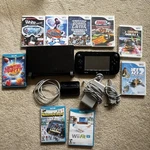 Nintendo Wiiu Console Bundle W/ 9 Games & All Cords Tested Working WUP-101(02) Used. Price: $145.00.