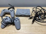 Sony Playstation Classic Gray SCPH-1000R With Remotes Used. Price: $50.00.
