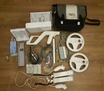 Nintendo Wii Lot - Hook Ups + 2 Controllers Extra Accessories Games Used. Price: $80.90.