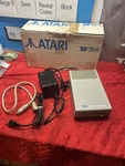 Atari SF354 External 3.5" Floppy Drive W/ Power Supply As Untested. Price: $100.00.