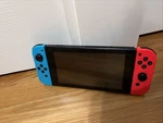 Barley Used Nintendo Switch & Charger. (has Some Games Downloaded On Already). Price: $250.00.