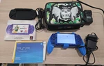 Sony Psp 2000 Metallic Blue Madden Ed. 128GB With Games, Case, And Accessories Used. Price: $500.00.