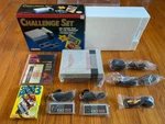Nintendo Nes Challenge Set Console System 100% Complete Box With Protector Used. Price: $500.00.
