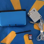 Nintendo 3DS Xl Blue Handheld Console W/ Charger, Stylus, 16GB Sd Card Used. Price: $280.00.