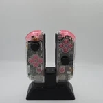 Nintendo Switch Clear Pink Joy-cons Used. Price: $90.00.