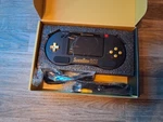 Hyperkin Supaboy Blackgold Console Open. Price: $99.99.