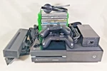 Xbox One Black Console + Sensor 2 Controllers Headset 10 Games Used. Price: $149.99.